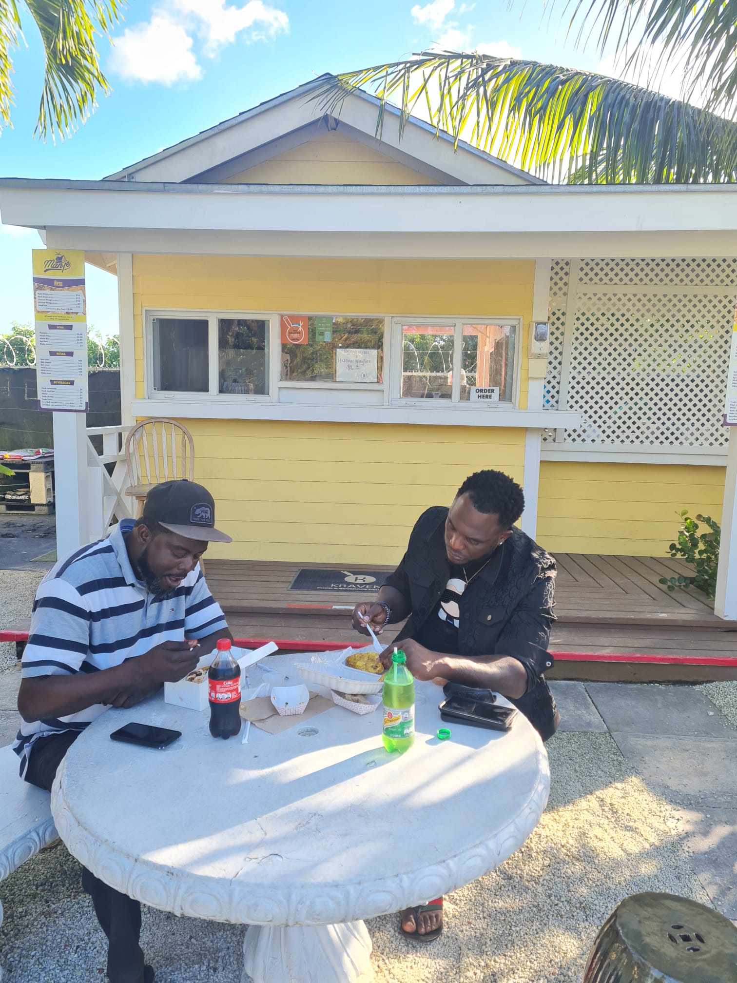 Manje customer with a Manje meal