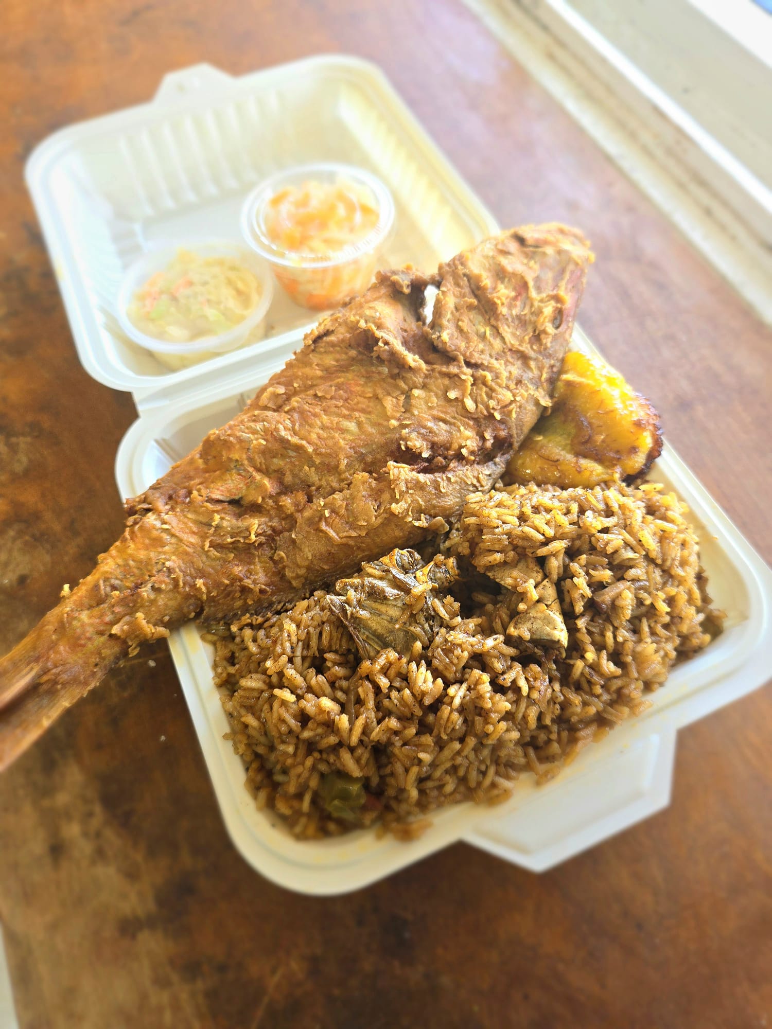 Fried snapper served with rice