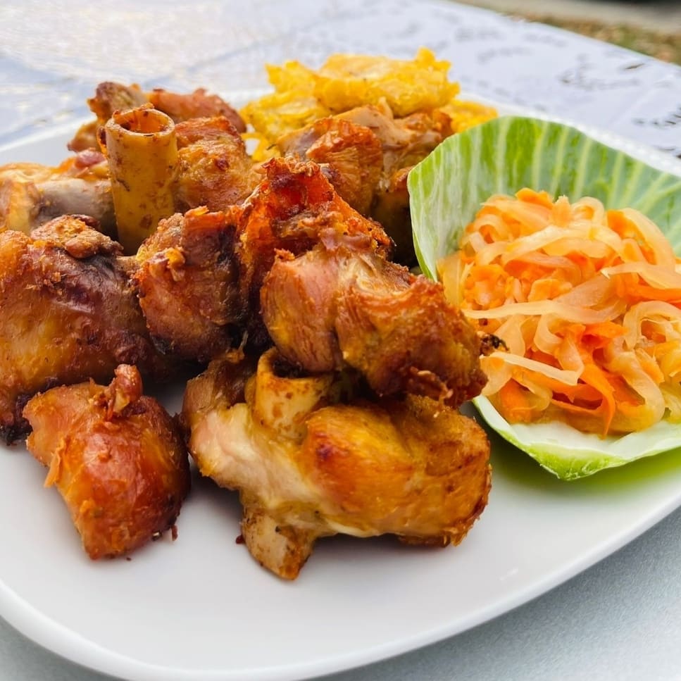 Tasso turkey with a side of pikliz